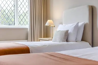 a hotel room with two beds and a window at 2 Bed in Ludlow oc-p31882 in Ludlow