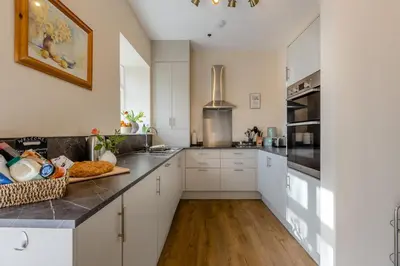 a kitchen with white cabinets and a counter top at 2 Bed in Ludlow oc-d31885 in Ludlow