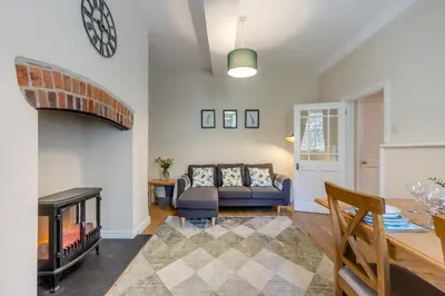 a living room with a couch and a table at 2 Bed in Ludlow oc-d31885 in Ludlow