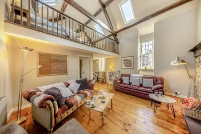 a living room with a couch and a table at 3 Bed in Dolgellau oc-h31822 in Dolgellau