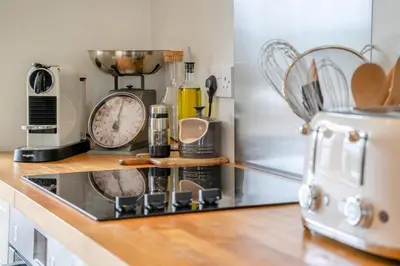 a kitchen with a counter top with a coffee maker at 6 Bed in Llanwern oc-w31947 in Brecon