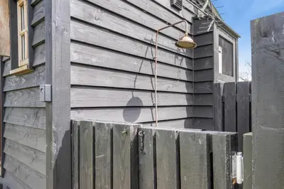 a building with a street light on the side of it at 1 Bed in Bronllys oc-t31950 in Bronllys