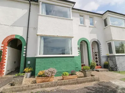 a house with green and white at Brycheiniog View in Brecon