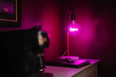 a pink lamp sitting on a table in a room at Unique Shrewsbury Rooms in Shrewsbury
