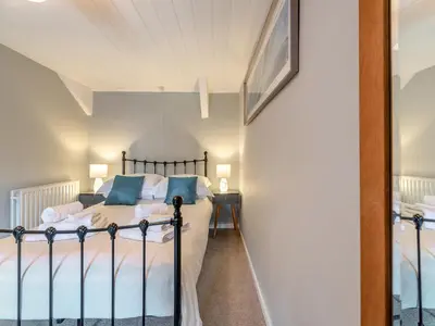a bedroom with a bed in a room at West Llwyn - Uk41757 in Rhyd Owen