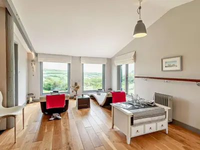 a living room with a couch and a table at 2 Bed in Hereford oc-42881 in Craswall