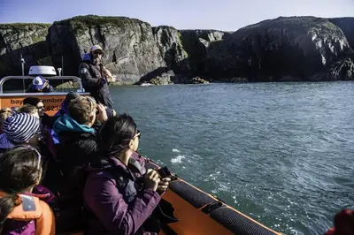 a group of people on a boat in the water at 1 Bed in Llwyngwril oc-a31970 in Llwyngwril