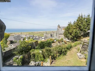 a view of a village from a window at Pen Y Bryn Bach in Harlech