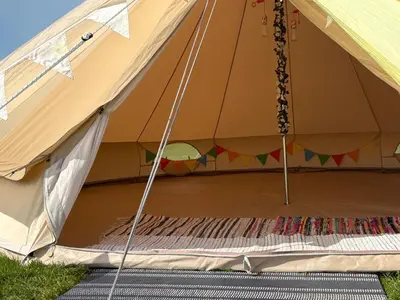 a tent with a mattress inside of it at 5 Metre 'UNFURNISED' Bell Tent in Ball