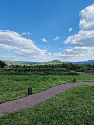 a path in the middle of a field at Oak Moor Shepherd Hut - Brecon Beacons, LD3 7TD in Tal-y-llyn