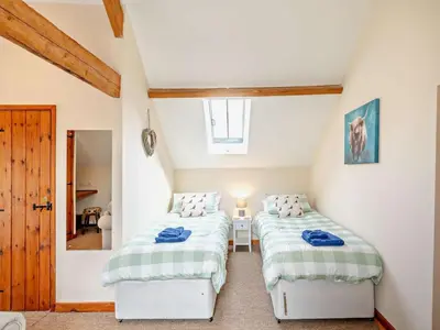 a bedroom with two beds in a attic at 2 Bed in Craven Arms oc-96046 in Tugford