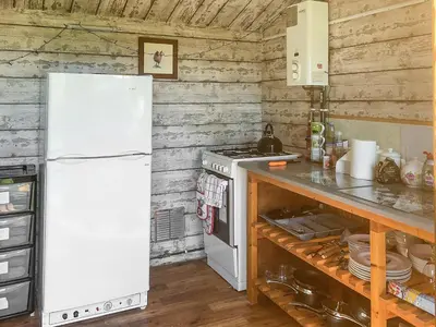 a kitchen with a white refrigerator and a stove at Brown Hare - Uk49799 in Brecon