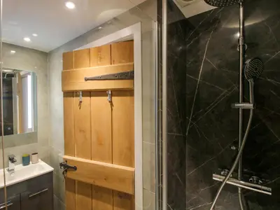 a bathroom with a shower and a sink at 10 Bridge Street in Craven Arms