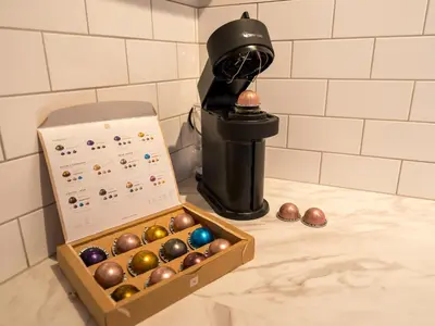 a box of ornaments next to a blow gun at The Loft - a stylish 2-bed in prime central location - Pass the Keys in Shrewsbury