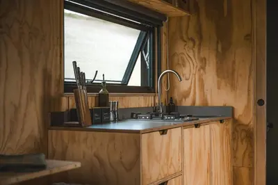 a kitchen with a sink and a window at Hydra in Llangollen