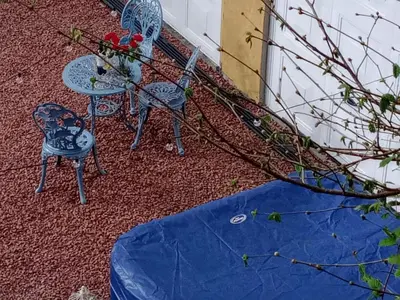 two chairs and a table and a table and chairs at Chandler Ranch Llandovery Cynghordy in Cynghordy