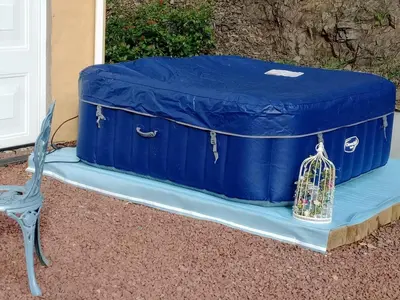 a blue trunk with a bird cage on top of it at Chandler Ranch Llandovery Cynghordy in Cynghordy