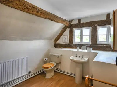 a bathroom with a toilet and a sink at Ford Farm in Ludlow