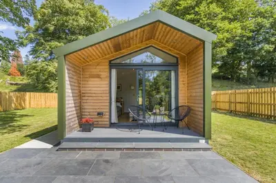 a small shed with two chairs on a patio at 2 Bed in Cemmaes oc-a32660 in Cemmaes