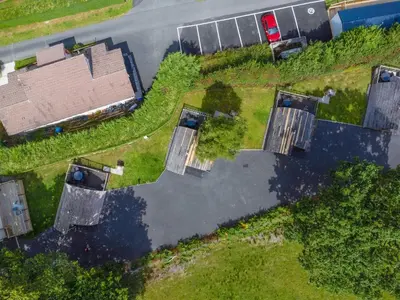 an overhead view of a yard with a building at Pod3 - Powys River Pods - Pet Friendly Glamping Pod Builth Wells Powys Wales in Garth