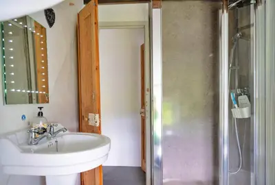 a bathroom with a sink and a shower at Finest Retreats - Penclogwynau in Dolgellau