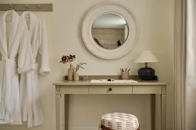 a dressing room with a table and a mirror at Market View - The Georgian House in Ludlow