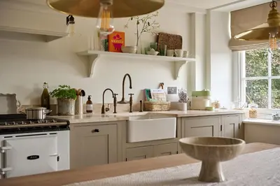 a kitchen with a sink and a counter top at Stretton Hills Peaks - The Georgian House in Ludlow