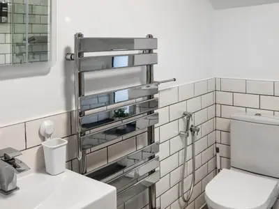 a bathroom with a toilet and a sink at Apartment Two - Uk49592 in Bala