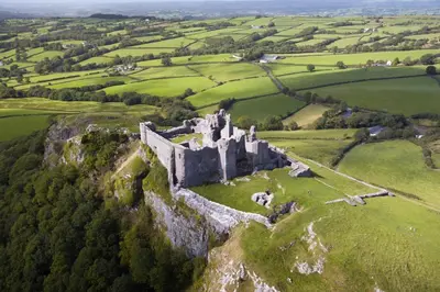 an old castle on a hill in a green field at 2 Bed in Defynnog oc-t32724 in Sennybridge