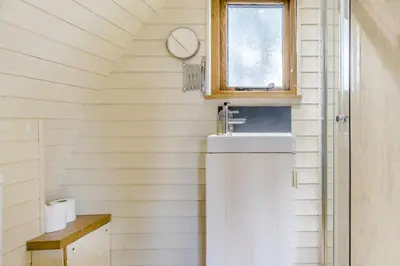 a bathroom with a sink and a window at 1 Bed in Garth oc-h32701 in Garth