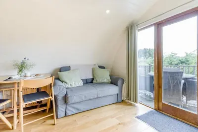 a living room with a couch and a table at 1 Bed in Garth oc-k32702 in Garth