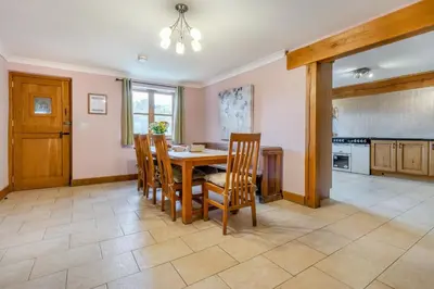 a kitchen and dining room with a table and chairs at 5 Bed in Devils Bridge oc-t13712 in Devils Bridge
