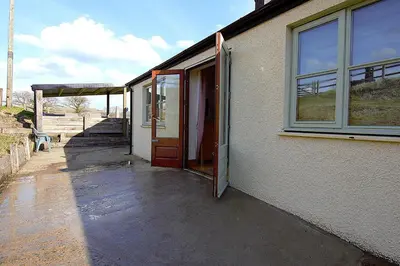 an open door of a building with a patio at 5 Bed in Devils Bridge oc-t13712 in Devils Bridge