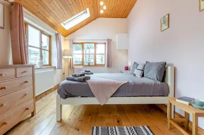 a bedroom with a bed and a wooden ceiling at 5 Bed in Devils Bridge oc-t13712 in Devils Bridge