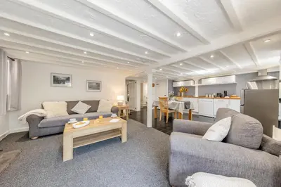 a living room with two couches and a table at 1 Bed in Capel Bangor oc-y33024 in Capel Bangor