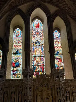 a large stained glass window in a church at Charming 2 bedroom cottage in Brecon - families and pets welcome! in Brecon