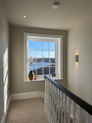 a staircase in a home with a window at Luxury Apartment in Shropshire sleeps 4 in Shrewsbury