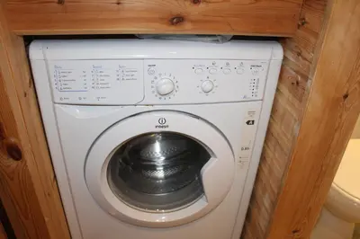 a washer and dryer in a small room at Luxurious lodge near Barmouth in Dyffryn