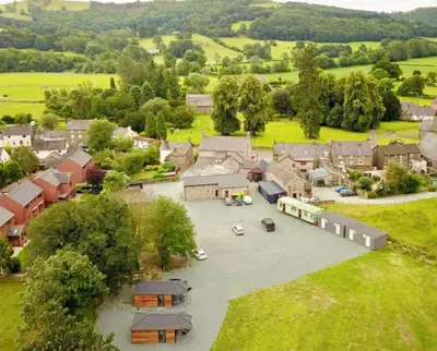 an aerial view of a village with a parking lot at The Kings Head, Meifod in Meifod