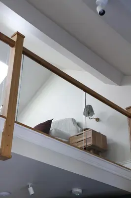 a glass window in a room with a couch at Luxury Apartment in Shropshire sleeps 4 in Shrewsbury