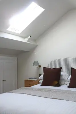 a bedroom with a bed with a skylight at Luxury Apartment in Shropshire sleeps 4 in Shrewsbury