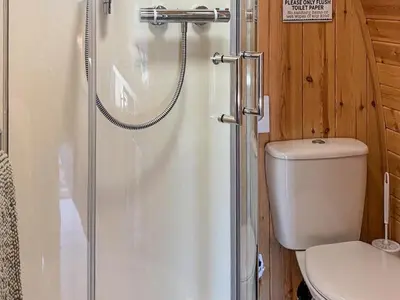 a bathroom with a toilet and a glass shower at The Orchard - Ukc7804 in Shrewsbury