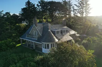 an aerial view of a house on a hill at Murmur Y Don in Harlech