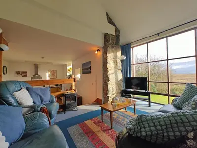 a living room with two couches and a television at 2 Bed in Llanelltyd oc-s34505 in Llanelltyd