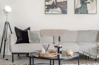 a living room with a couch and a table at 3 Bed in Leominster oc-w34380 in Leominster