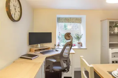 an office with a desk with a chair and a computer at 4 Bed in Ganllwyd oc-g34601 in Mallwyd