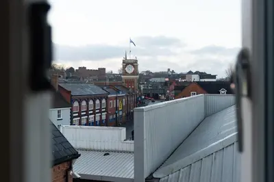 a view of a city with a clock tower at Professionals welcome - Near Town Centre - Free Parking-Sleeps 4 in Shrewsbury