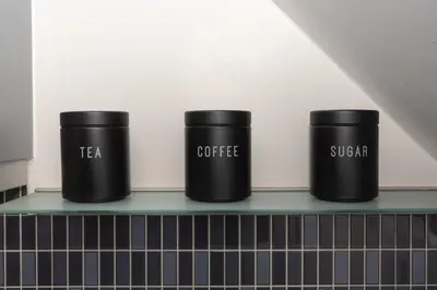 three black coffee cups sitting on a shelf at Professionals welcome - Near Town Centre - Free Parking-Sleeps 4 in Shrewsbury