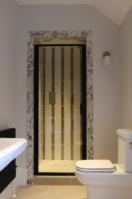 a bathroom with a shower with a toilet at Spacious Luxury Apartment in the Heart of Shrewsbury Sleeps 6 in Shrewsbury