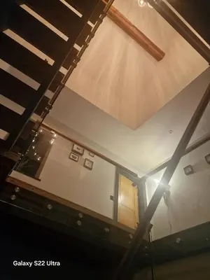 an overhead view of the ceiling of a building at Luxurious 5-Bedroom House Rental with Scenic Countryside Views in Hereford